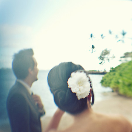 flower hair fascinator low back wedding dress hawaii outdoor wedding